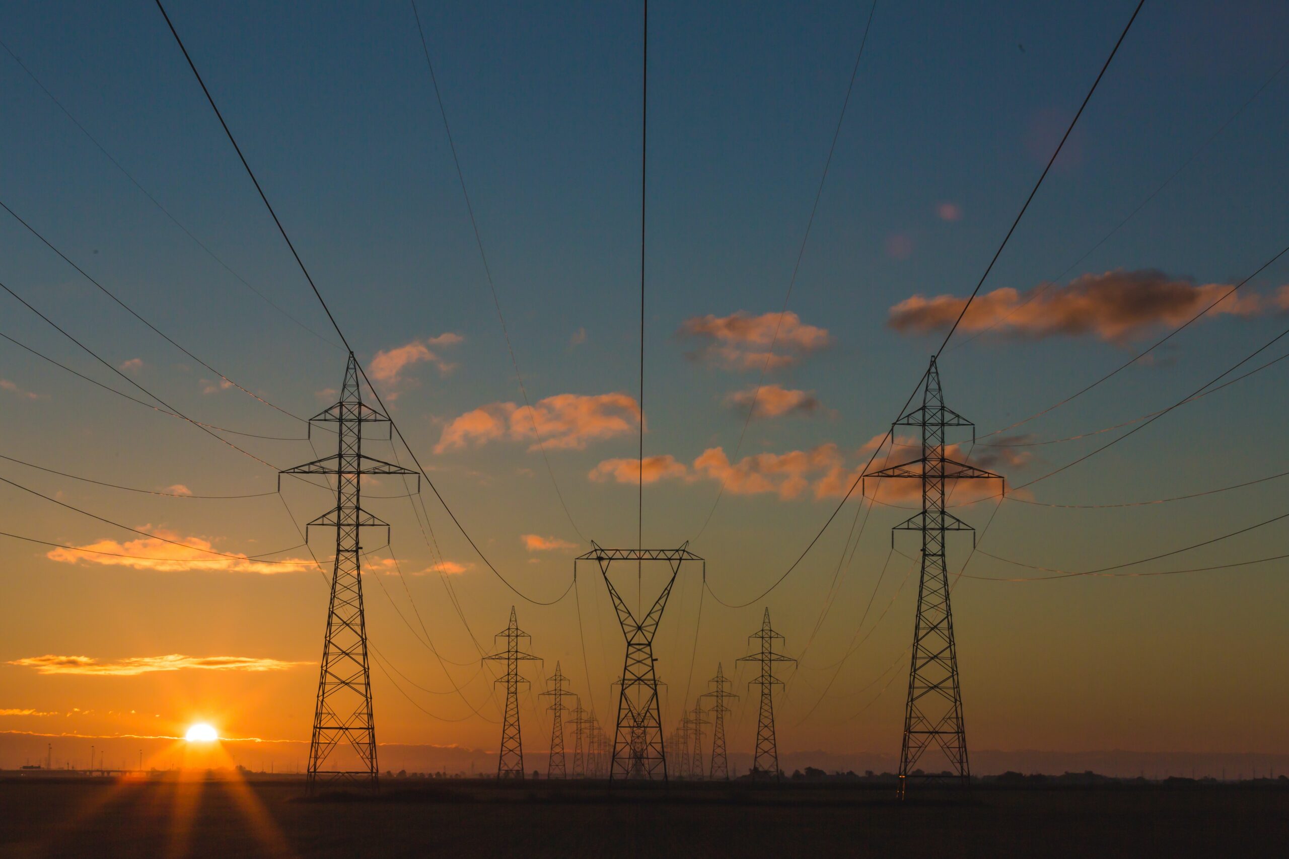 Power pylons at sunset